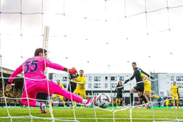250410 Ulrik Saltnes of Bodo Glimt scores the 1-0 goal behind goalkeeper Christos Mandas of Lazio during the UEFA Europa League quarter-final football match between Bodo Glimt and Lazio on April 10, 2025 in Bodo. Photo: Marius Simensen BILDBYRAN COP 238 bbeng bodo bodo glimt football fotball fotboll kvartfinale lazio quarter-final soccer uefa europa league Copyright: MARIUSxSIMENSEN BB250410BB906