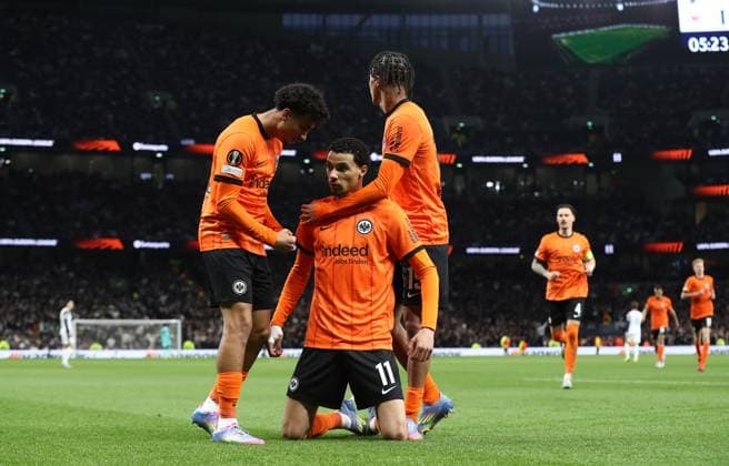 10.04.2025, xtgx, Fussball Europa League 1 4 Finale, Tottenham Hotspur - Eintracht Frankfurt v.l. Nathaniel Brown (Eintracht Frankfurt), Hugo Ekitike (Eintracht Frankfurt) celebrate the goal, Der Torjubel zum 0:1, Jean-Matteo Bahoya (Eintracht Frankfurt) (DFL DFB REGULATIONS PROHIBIT ANY USE OF PHOTOGRAPHS as IMAGE SEQUENCES and or QUASI-VIDEO) London