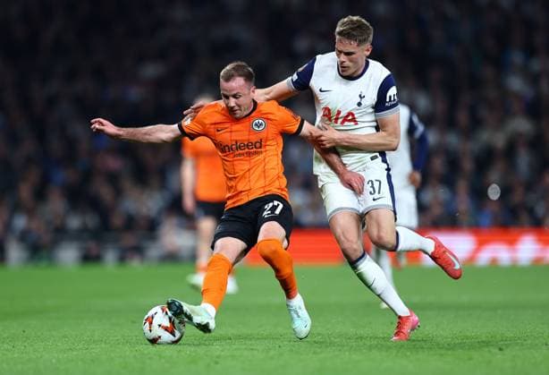 Micky van de Ven of Tottenham Hotspur competes for the ball with Mario Gotze of Eintracht Frankfurt Tottenham Hotspur v Eintracht Frankfurt, UEFA Europa League, Quarter Final, First Leg, Football, Tottenham Hotspur Stadium, London, UK - 10 Apr 2025 EDITORIAL USE ONLY No use with unauthorised audio, video, data, fixture lists, club league logos or live services. Online in-match use limited to 120 images, no video emulation. No use in betting, games or single club league player publications. Copyright: xMichaelxZemanek Shutterstockx 15243632z