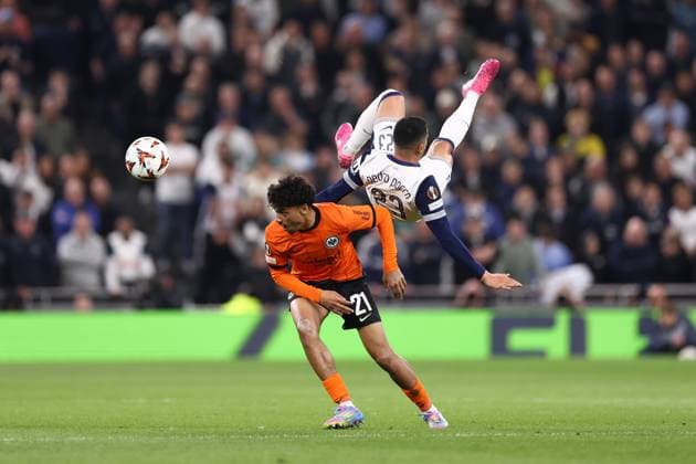 Tottenham Hotspur v Eintracht Frankfurt 10 April 2025, London - UEFA Europa League Quarter Final - First Leg - Tottenham Hotspur v Pedro Porro of Tottenham Hotspur goes over the top of Eintracht Frankfurt - Nathaniel Brown of Eintracht Frankfurt - Photo: Jacques Feeney Offside. London UK Copyright: xJacquesxFeeneyx xOffsidexOffside