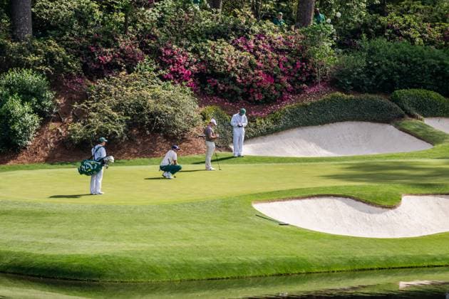 250410 Ludvig Aberg of Sweden and Rory McIlroy of Northern Ireland on the 12th green during the first round of the 2025 Masters Golf Tournament on April 10, 2025 in Augusta. Photo: Petter Arvidson BILDBYRAN kod PA PA1007 bbeng golf masters the masters augusta us masters sverige Amen Corner Copyright: PETTERxARVIDSON BB250410PA202