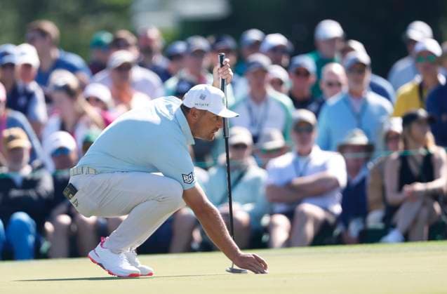 Bryson DeCambeau lines up a putt on the second green during round two of the 2025 Masters golf tournament at Augusta National Golf Club in Augusta, Georgia, on Friday, April 11, 2025.  AUG20250411542 JOHNxANGELILLO