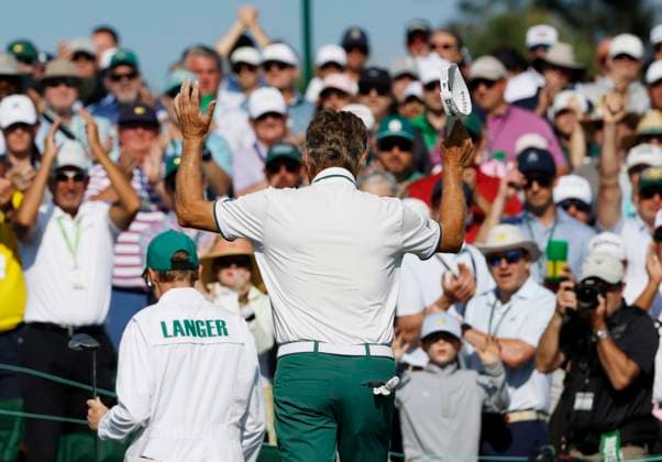 Bernhard Langer of Germany reacts to patrons applause on the 18th green during the second round of the 2025 Masters golf tournament at Augusta National Golf Club in Augusta, Georgia, on Friday, April 11, 2025. Langer a two-time winner of the green jacket in 1985 and 1993 had announced that his 41st Masters appearance will be his last. Langer missed the cut making a bogey on the 18th hole.  AUG202504112006 JOHNxANGELILLO