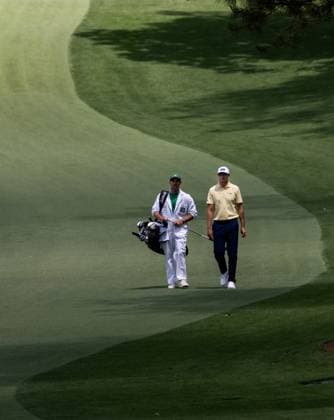 250411 Ludvig Aberg of Sweden with his caddie Joe Skovron during the second round of the 2025 Masters Golf Tournament on April 11, 2025 in Augusta. Photo: Petter Arvidson BILDBYRAN kod PA PA1008 bbeng golf masters the masters augusta us masters Copyright: PETTERxARVIDSON BB250411PA194