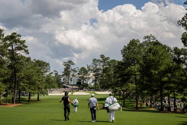 250411 Min Woo Lee of Australia and Collin Morikawa of the United States during the second round of the 2025 Masters Golf Tournament on April 11, 2025 in Augusta. Photo: Petter Arvidson BILDBYRAN kod PA PA1008 bbeng golf masters the masters augusta us masters Copyright: PETTERxARVIDSON BB250411PA210