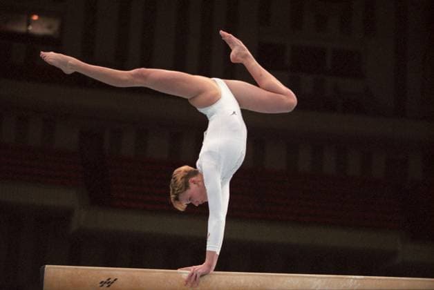 Archivbilder der Woche SPORT KW15 Svetlana Khorkina at World Artistic Gymnastics Championships 8891687 09.10.1999 Tianjin, China. October 8-16, 1999. The 34th World Artistic Gymnastics Championships. Photo: Russian gymnast Svetlana Khorkina exercises on the balance beam during the all-round women s team event. Vladimir Rodionov China  Copyright: xVladimirxRodionovx