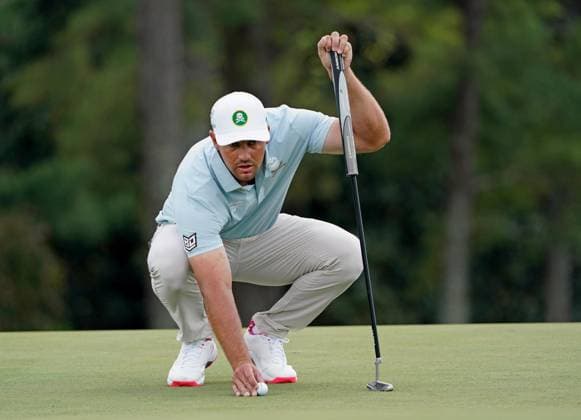 Golf: Masters Tournament Bryson DeChambeau of the United States lines up a putt during the second round of the Masters Tournament at Augusta National Golf Club in Augusta, Georgia, on April 11, 2025.  A14AA0004435941P
