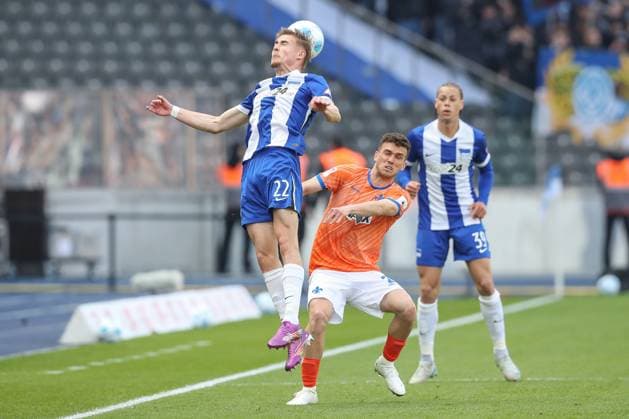 12.04.2025, xtgx, Fussball - 2.Bundesliga, Hertha BSC Berlin - SV Darmstadt 98 emspor, v.l. Marten Winkler (Hertha, 22), Sergio Lopez (Darmstadt, 2) Zweikampf, Duell, Kampf, tackle (DFL DFB REGULATIONS PROHIBIT ANY USE OF PHOTOGRAPHS as IMAGE SEQUENCES and or QUASI-VIDEO) Berlin