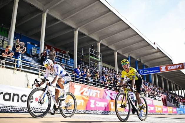 Dutch Lorena Wiebes of SD Worx-Protime and Dutch Marianne Vos of Team Visma-Lease a Bike pictured in action during the women s race of the Paris-Roubaix one day cycling race, 148,5 km from Denain to Roubaix, France, on Saturday 12 April 2025. JASPERxJACOBS  x120625131x