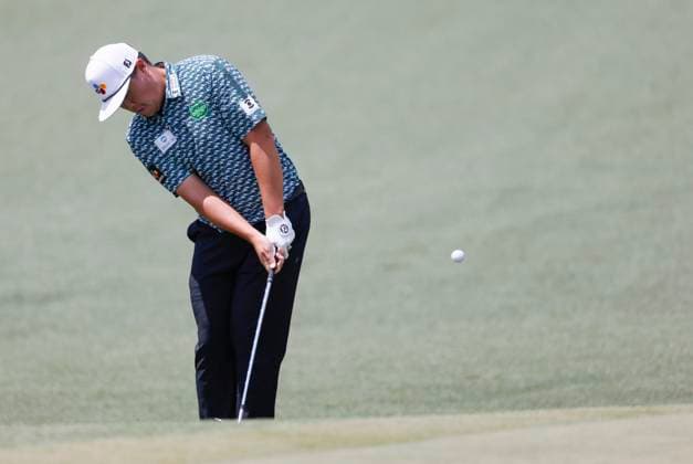 Sungjae Im of South Korea chips into the cup for an eagle on the second hole during the third round of the 2025 Masters golf tournament at Augusta National Golf Club in Augusta, Georgia, on Saturday, April 12, 2025.  AUG20250412505 TANNENxMAURY