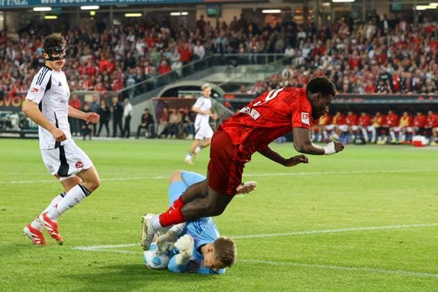 12.04.2025, xmohx, Fussball 2.Bundesliga, 1.FC Kaiserslautern - 1.FC Nürnberg v.l. Ragnar Ache (1. FC Kaiserslautern) Jan Reichert (1.FC Nuernberg) Zweikampf, Aktion, action, battle for the ball (DFL DFB REGULATIONS PROHIBIT ANY USE OF PHOTOGRAPHS as IMAGE SEQUENCES and or QUASI-VIDEO) Kaiserslautern