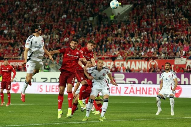 12.04.2025, xrekx, Fussball 2.Bundesliga, 1.FC Kaiserslautern - 1.FC Nürnberg v.l. Torschuss zum 0:1 durch Fabio Gruber (1.FC Nuernberg) (DFL DFB REGULATIONS PROHIBIT ANY USE OF PHOTOGRAPHS as IMAGE SEQUENCES and or QUASI-VIDEO) Kaiserslautern