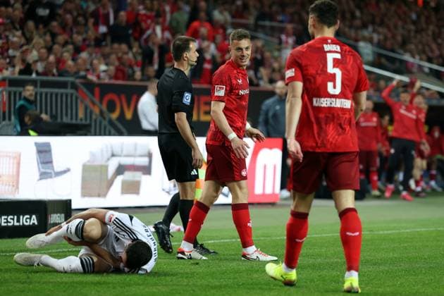 12.04.2025, xrekx, Fussball 2.Bundesliga, 1.FC Kaiserslautern - 1.FC Nürnberg v.l. Mahir Emreli (1.FC Nuernberg) verletzt, Verletzung, Schmerz, Schmerzen, injured, injury, pain, pains Filip Kaloc (1.FC Kaiserslautern) (DFL DFB REGULATIONS PROHIBIT ANY USE OF PHOTOGRAPHS as IMAGE SEQUENCES and or QUASI-VIDEO) Kaiserslautern