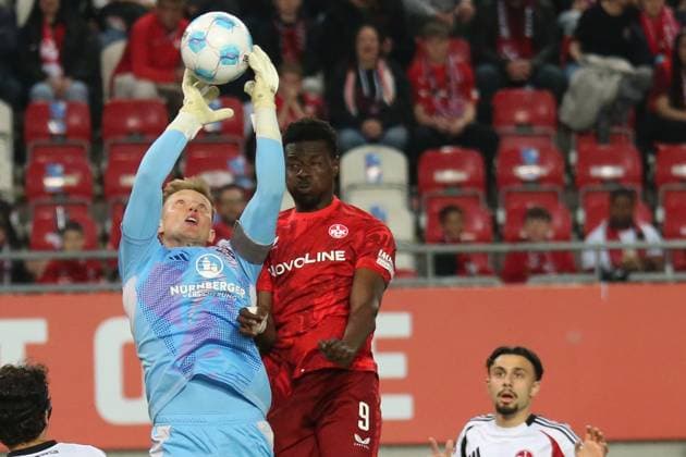 12.04.2025, xmohx, Fussball 2.Bundesliga, 1.FC Kaiserslautern - 1.FC Nürnberg v.l. Jan Reichert (1.FC Nuernberg) Ragnar Ache (1. FC Kaiserslautern) Zweikampf, Aktion, action, battle for the ball (DFL DFB REGULATIONS PROHIBIT ANY USE OF PHOTOGRAPHS as IMAGE SEQUENCES and or QUASI-VIDEO) Kaiserslautern