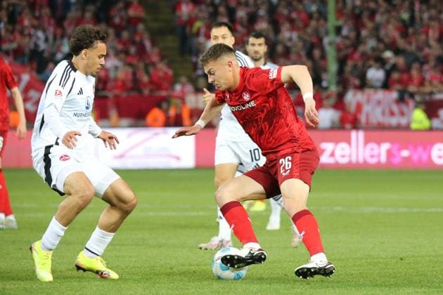 12.04.2025, xmohx, Fussball 2.Bundesliga, 1.FC Kaiserslautern - 1.FC Nürnberg v.l. Rafael Lubach (1.FC Nuernberg) Filip Kaloc (1. FC Kaiserslautern) Zweikampf, Aktion, action, battle for the ball (DFL DFB REGULATIONS PROHIBIT ANY USE OF PHOTOGRAPHS as IMAGE SEQUENCES and or QUASI-VIDEO) Kaiserslautern