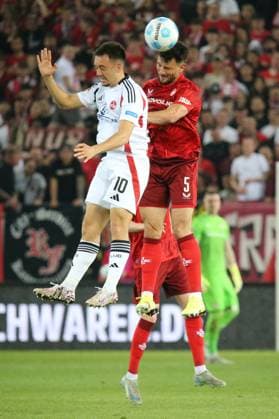 12.04.2025, xmohx, Fussball 2.Bundesliga, 1.FC Kaiserslautern - 1.FC Nürnberg v.l. Julian Justvan (1.FC Nuernberg) Maximilian Bauer (1. FC Kaiserslautern) Zweikampf, Aktion, action, battle for the ball (DFL DFB REGULATIONS PROHIBIT ANY USE OF PHOTOGRAPHS as IMAGE SEQUENCES and or QUASI-VIDEO) Kaiserslautern