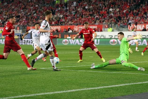 12.04.2025, xrekx, Fussball 2.Bundesliga, 1.FC Kaiserslautern - 1.FC Nürnberg v.l. Lukas Schleimer (1.FC Nuernberg) Julian Krahl (1.FC Kaiserslautern) (DFL DFB REGULATIONS PROHIBIT ANY USE OF PHOTOGRAPHS as IMAGE SEQUENCES and or QUASI-VIDEO) Kaiserslautern