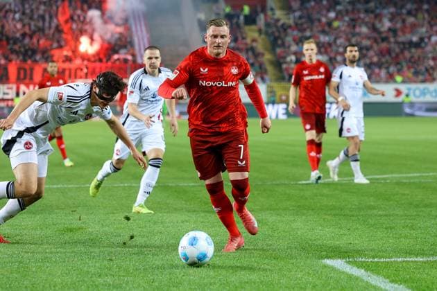 12.04.2025, xmohx, Fussball 2.Bundesliga, 1.FC Kaiserslautern - 1.FC Nürnberg v.l. Fabio Gruber (1.FC Nuernberg) Marlon Ritter (1. FC Kaiserslautern) Zweikampf, Aktion, action, battle for the ball (DFL DFB REGULATIONS PROHIBIT ANY USE OF PHOTOGRAPHS as IMAGE SEQUENCES and or QUASI-VIDEO) Kaiserslautern
