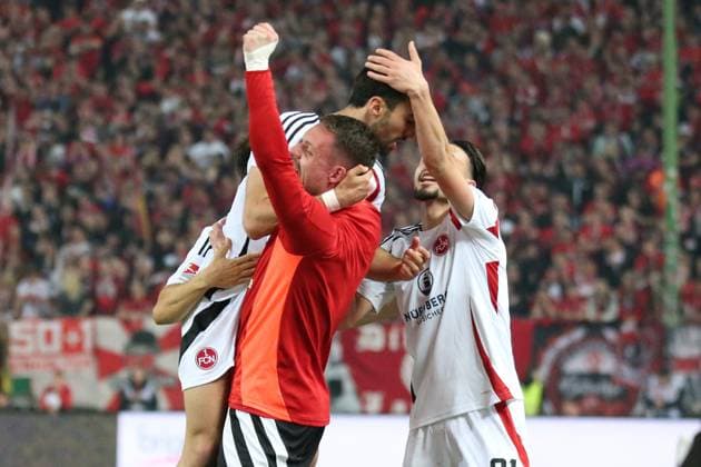 12.04.2025, xmohx, Fussball 2.Bundesliga, 1.FC Kaiserslautern - 1.FC Nürnberg v.l. Torjubel nach dem Tor zum celebrating the goal celebrate 0:2 durch Mahir Emreli (1.FC Nuernberg) (DFL DFB REGULATIONS PROHIBIT ANY USE OF PHOTOGRAPHS as IMAGE SEQUENCES and or QUASI-VIDEO) Kaiserslautern