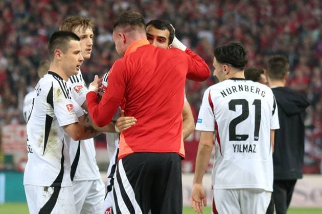 12.04.2025, xmohx, Fussball 2.Bundesliga, 1.FC Kaiserslautern - 1.FC Nürnberg v.l. Torjubel nach dem Tor zum celebrating the goal celebrate 0:2 durch Mahir Emreli (1.FC Nuernberg) (DFL DFB REGULATIONS PROHIBIT ANY USE OF PHOTOGRAPHS as IMAGE SEQUENCES and or QUASI-VIDEO) Kaiserslautern