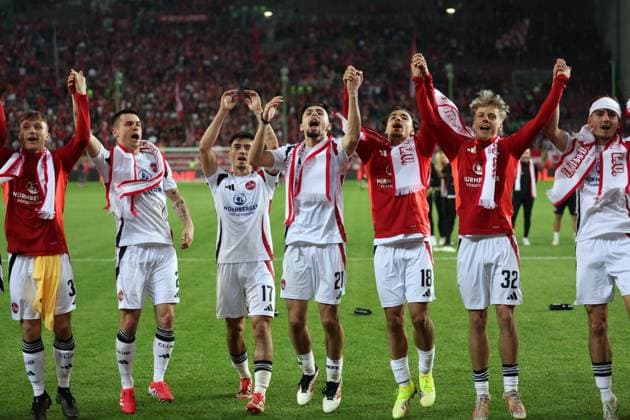 12.04.2025, xrekx, Fussball 2.Bundesliga, 1.FC Kaiserslautern - 1.FC Nürnberg v.l. Jens Castrop (1.FC Nuernberg) Berkay YÄ±lmaz (1.FC Nuernberg) Mannschaft, Spieler, jubeln nach Spielende, Team, Player, celebrate at the end of the match (DFL DFB REGULATIONS PROHIBIT ANY USE OF PHOTOGRAPHS as IMAGE SEQUENCES and or QUASI-VIDEO) Kaiserslautern