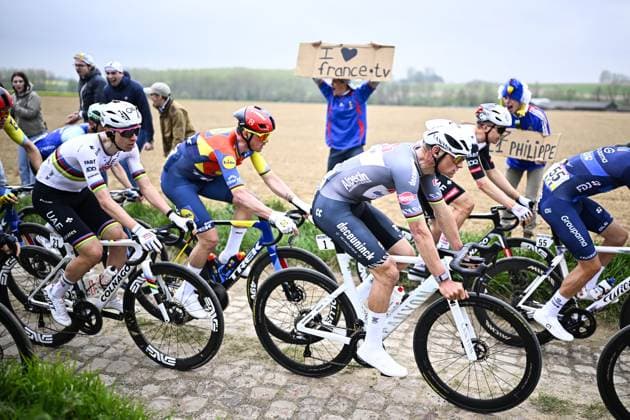 Slovenian Tadej Pogacar of UAE Team Emirates, Danish Mads Pedersen of Lidl-Trek and Dutch Mathieu van der Poel of Alpecin-Deceuninck pictured in action during the men elite race of the Paris-Roubaix one day cycling race, 259,2 km from Compiegne to Roubaix, France, on Sunday 13 April 2025. JASPERxJACOBS  x120710114x