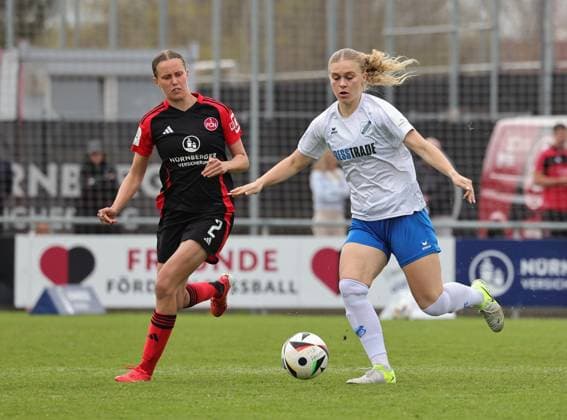 13.04.2025 - Fussball - Saison 2024 2025 - 2. Frauen - Fussball - Bundesliga - 21. Spieltag: 1. FC Nürnberg FCN ( Club Clubfrauen ) - SC Sand - Sportfoto Zink DaMa - xdaxmax - Klara Svensson Senelius (2, 1. FC Nürnberg FCN ) Cecilia Way (8, SC Sand )