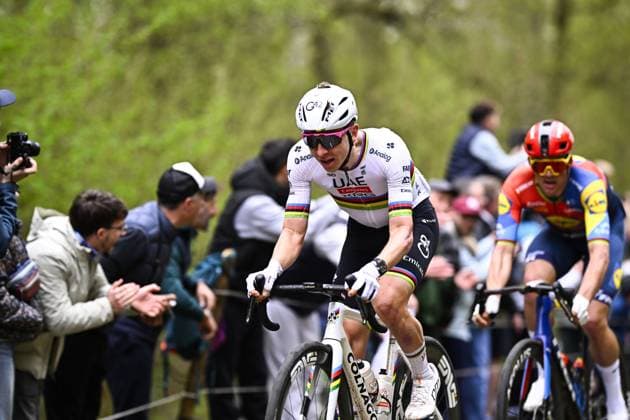 Slovenian Tadej Pogacar of UAE Team Emirates pictured in action at TrouÃ e d Arenberg during the men elite race of the Paris-Roubaix one day cycling race, 259,2 km from Compiegne to Roubaix, France, on Sunday 13 April 2025. JASPERxJACOBS  x120714499x