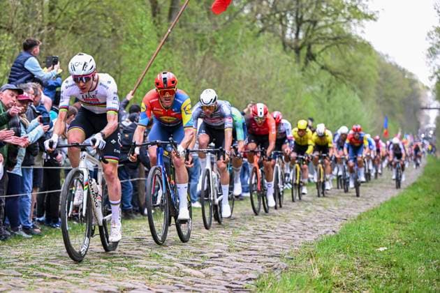 Paris Roubaix 2025 Cycling Race Roubaix, France - April 13 : Van Der Poel Mathieu (NED) of Alpecin - Deceuninck, Pedersen Mads (DEN) of Lidl - Trek, Pogacar Tadej (SLO) of UAE Team Emirates - XRG leading the peloton in the Trouee d Arenberg during the 122nd edition of Paris Roubaix an UCI World Tour cycling race for Men Elite of 259,7 kms with start in Compiegne and finish at the Velodrome Andre-Petrieux in Roubaix on April 13, 2025 in Roubaix, France, 13 04 2025 ( Motordriver Kenny Verfaillie - Roubaix France  Copyright: xVincentxKalutx