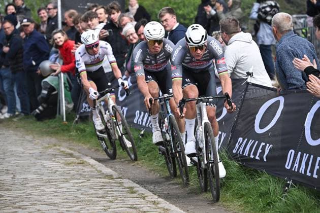 Slovenian Tadej Pogacar of UAE Team Emirates, Belgian Jasper Philipsen of Alpecin-Deceuninck and Dutch Mathieu van der Poel of Alpecin-Deceuninck pictured in action during the men elite race of the Paris-Roubaix one day cycling race, 259,2 km from Compiegne to Roubaix, France, on Sunday 13 April 2025. AFPxPOOLxPAPONxBERNARD  x120734424x