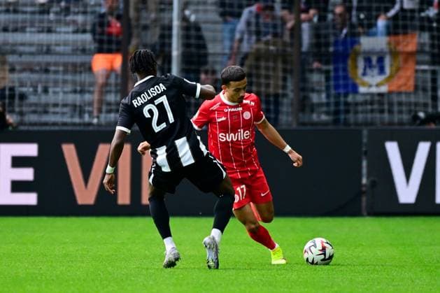 FOOTBALL : Angers vs Montpellier - Ligue 1 - 13 04 2025 correction iptc Theo SAINTE LUCE ( 17 - Montpellier ) and Lilian RAOLISOA ( 27 - Angers ) during the Ligue 1 match between Angers SCO and Montpellier HSC at Stade Raymond Kopa on April 13, 2025 in Angers, France. ( Photo by Dante Badano PsnewZ ) - AngersFrance  Copyright: xDantexBadanox
