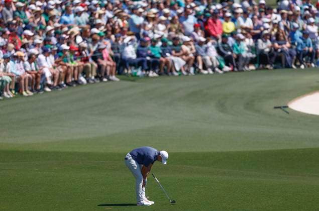 Rory McIlroy of Northern Ireland reacts after making a pitch shot to the 2nd green during the final round of the 2025 Masters golf tournament at Augusta National Golf Club in Augusta, Georgia, on Sunday, April 13, 2025.  AUG20250413513 JOHNxANGELILLO