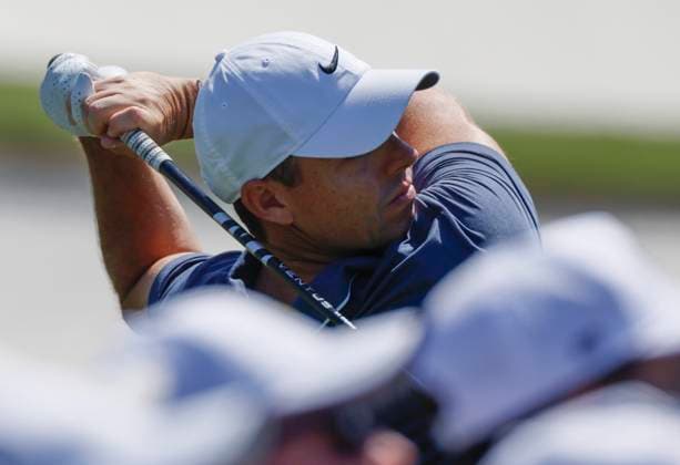Rory McIlroy of Northern Ireland hits an iron on the 3rd hole during the final round of the 2025 Masters golf tournament at Augusta National Golf Club in Augusta, Georgia, on Sunday, April 13, 2025.  AUG20250413522 TANNENxMAURY