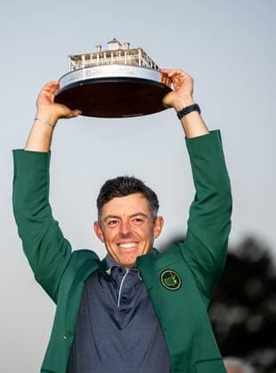 250413 Rory McIlroy of Northern Ireland celebrates with the trophy and his green jacket after winning the final round of the 2025 Masters Golf Tournament on April 13, 2025 in Augusta. Photo: Petter Arvidson BILDBYRAN kod PA PA1010 bbeng golf masters the masters augusta us masters jubel Copyright: PETTERxARVIDSON BB250413PA172