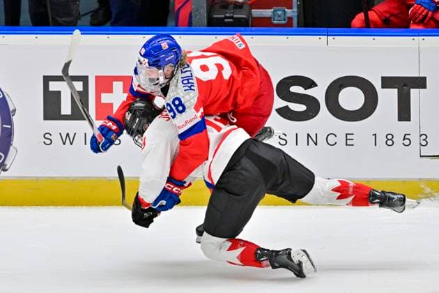 Kristyna Kaltounkova (CZE; up) and Brianne Jenner (CAN) in action during the IIHF Women s World Championship, WM, Weltmeisterschaft Group A, match Czechia vs Canada, in Ceske Budejovice, Czech Republic, on April 14, 2025. (CTKxPhoto VaclavxPancer) CTKPhotoP2025041407116  CTKPhotoP2025041407116