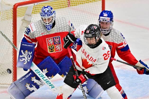 L-R goalkeeper Klara Peslarova (CZE), Emily Clark (CAN) and Kristyna Kaltounkova (CZE) in action during the IIHF Women s World Championship, WM, Weltmeisterschaft Group A, match Czechia vs Canada, in Ceske Budejovice, Czech Republic, on April 14, 2025. (CTKxPhoto VaclavxPancer) CTKPhotoP2025041407448  CTKPhotoP2025041407448