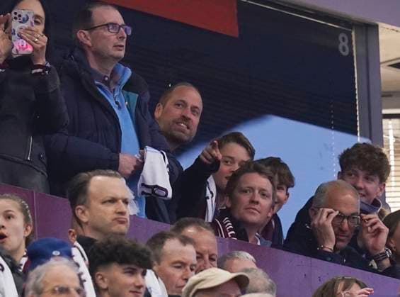 Birmingham, England, 15th April 2025. Aston Villa fans Prince Wiliam and his son Prince George look on during the Aston Villa vs Paris Saint Germain Quarter Final 2nd Leg UEFA Champions League match at Villa Park, Birmingham. Picture credit should read: Andrew Yates Sportimage EDITORIAL USE ONLY. No use with unauthorised audio, video, data, fixture lists, club league logos or live services. Online in-match use limited to 120 images, no video emulation. No use in betting, games or single club league player publications. SPI_026_AY_Villa_PSG SPI-3842-0026