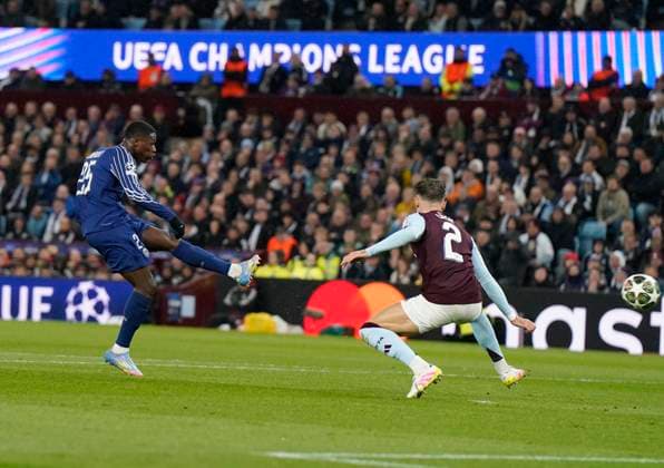 Birmingham, England, 15th April 2025. Nuno Mendes of Paris St Germain scores their second goal during the Aston Villa vs Paris Saint Germain Quarter Final 2nd Leg UEFA Champions League match at Villa Park, Birmingham. Picture credit should read: Andrew Yates Sportimage EDITORIAL USE ONLY. No use with unauthorised audio, video, data, fixture lists, club league logos or live services. Online in-match use limited to 120 images, no video emulation. No use in betting, games or single club league player publications. SPI_046_AY_Villa_PSG SPI-3842-0046