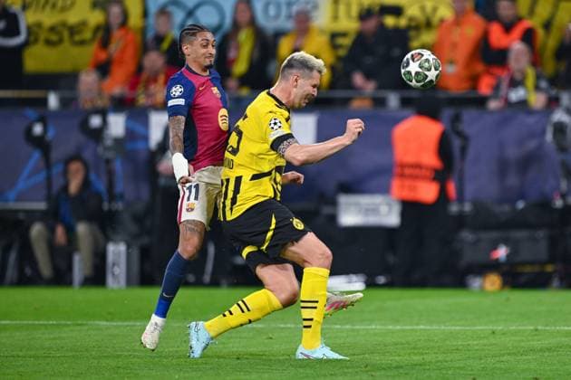 15.04.2025, Fussball, Champions League, Viertelfinale, Saison 2024 2025, Borussia Dortmund - FC Barcelona, Barca Raphinha (FC Barcelona), Niklas Süle (Borussia Dortmund) xRHR-FOTO TKx Copyright: RHR-FOTOx RHR-FOTO TK