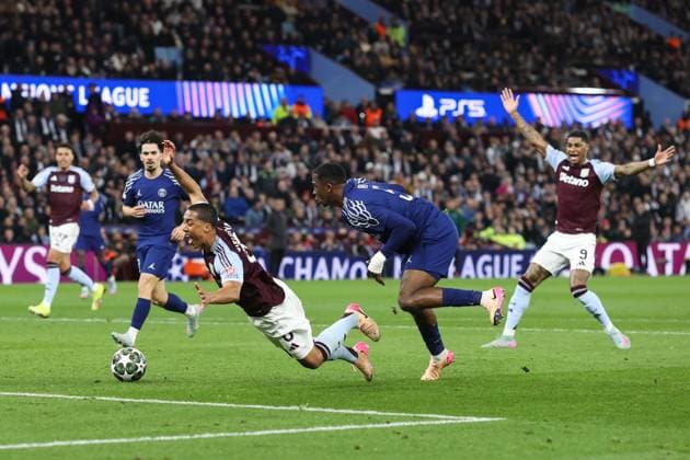 Aston Villa v PSG 15 April 2025, Aston - Champions League Football, Quarter-Final, Second Leg - Aston Villa v Paris Saint-Germain - Willian Pacho of PSG trips Youri Tielemans of Aston Villa - Photo: Charlotte Wilson Offside. Aston UK Copyright: xCharlottexWilsonx xOffsidexOffside
