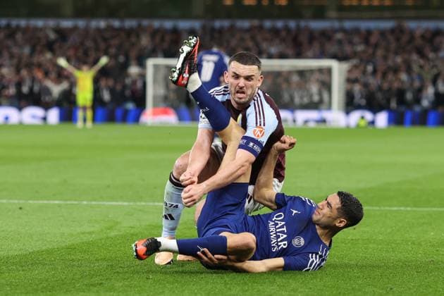 Aston Villa v PSG 15 April 2025, Aston - Champions League Football, Quarter-Final, Second Leg - Aston Villa v Paris Saint-Germain - John McGinn of Aston Villa and Achraf Hakimi of PSG - Photo: Charlotte Wilson Offside. Aston UK Copyright: xCharlottexWilsonx xOffsidexOffside