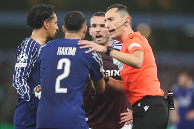 Aston Villa v PSG 15 April 2025, Aston - Champions League Football, Quarter-Final, Second Leg - Aston Villa v Paris Saint-Germain - John McGinn of Aston Villa argues with Achraf Hakimi of PSG - Photo: Charlotte Wilson Offside. Aston UK Copyright: xCharlottexWilsonx xOffsidexOffside