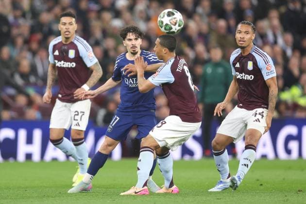Aston Villa v PSG 15 April 2025, Aston - Champions League Football, Quarter-Final, Second Leg - Aston Villa v Paris Saint-Germain - Vitinha of PSG and Youri Tielemans of Aston Villa - Photo: Charlotte Wilson Offside. Aston UK Copyright: xCharlottexWilsonx xOffsidexOffside