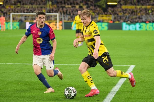Fußball, Championsleague, 20250415, BV Borussia Dortmund - FC Barcelona, Barca Im Bild v.l. GAVI (Barcelona, 6), Daniel SVENSSON (Dortmund, 24) Dribbling Ball Strafraum. Dortmund Signal Iduna Park Nordrhein-Westfalen Deutschland Copyright: Passion2Press MarkusxFischerx