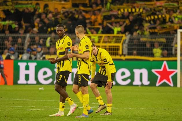 15.04.2025, xfanx, Fussball UEFA Champions League, Borussia Dortmund - FC Barcelona, Barca v.l. Serhou Guirassy (BVB) und Waldemar Anton (BVB) (DFL DFB REGULATIONS PROHIBIT ANY USE OF PHOTOGRAPHS as IMAGE SEQUENCES and or QUASI-VIDEO) Dortmund