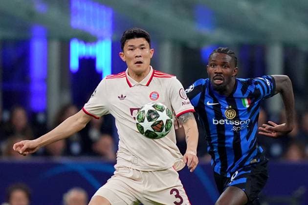 Bayern s Kim Min-jae fights for the ball with Inter Milan s Marcus Thuram during the Uefa Champions League soccer match between Inter and Bayern Munich at San Siro Stadium in Milan , North Italy - , Wednesday April 16, 2025 . - Soccer  Copyright: xSpada LaPressex
