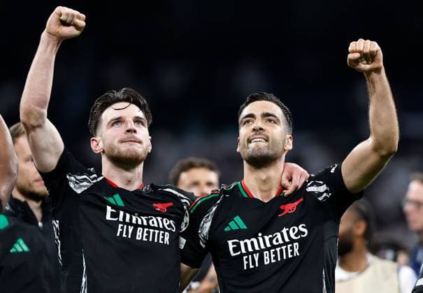 Declan Rice and Mikel Merino of Arsenal celebrate at full time Real Madrid v Arsenal, UEFA Champions League, Quarter-Finals, 2nd Leg, Football, Santiago Bernabu Stadium, Madrid, Spain - 16 Apr 2025 EDITORIAL USE ONLY No use with unauthorised audio, video, data, fixture lists, club league logos or live services. Online in-match use limited to 120 images, no video emulation. No use in betting, games or single club league player publications.  Copyright: xRubenxAlbarran Shutterstockx 15253938dz