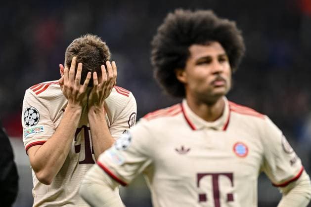 Josip Stanisic (FC Bayern Muenchen) und Serge Gnabry (FC Bayern Muenchen) look dejected during the UEFA Champions League 2024 25 Quarter Final Second Leg match between FC Internazionale Milano and FC Bayern München at San Siro on April 16, 2025 in Milan, Italy. (Photo by Harry Langer DeFodi Images)