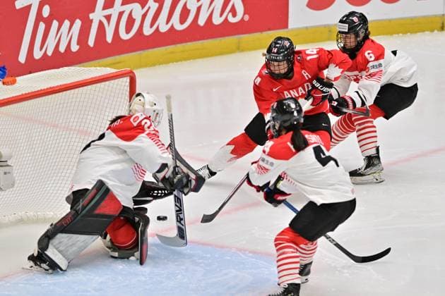 L-R goalkeeper Miyuu Masuhara (JPN), Ayaka Hitosato (JPN), Renata Fast (CAN) and Kohane Sato (JPN) in action during the IIHF Women s World Championship, WM, Weltmeisterschaft quarterfinal match Canada vs Japan, in Ceske Budejovice, Czech Republic, on April 17, 2025. (CTKxPhoto VaclavxPancer) CTKPhotoP2025041708420  CTKPhotoP2025041708420