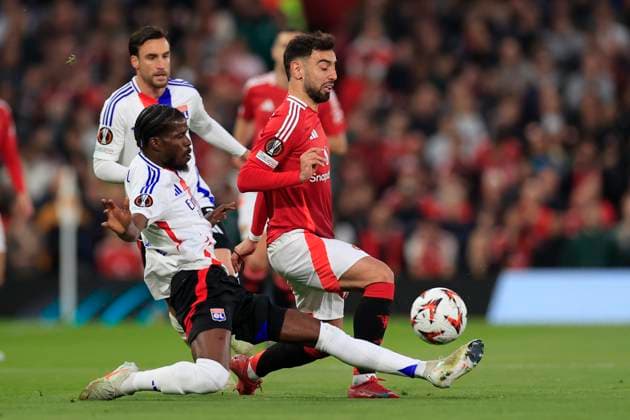 Manchester United, ManU v Olympique Lyonnais Europa League 17 04 2025. Quarter Final leg 2 of 2 Bruno Fernandes (8) of Manchester United is fouled by Paul Akouokou (4) of Olympique Lyonnais during the Europa League quarter final second leg match between Manchester United and Olympique Lyonnais at Old Trafford, Manchester, England on 17 April 2025. Manchester Old Trafford Greater Manchester England Editorial use only , Copyright: xConorxMolloyx PSI-21857-0043